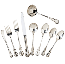 Sterling silver forks, knives, and spoons on white background